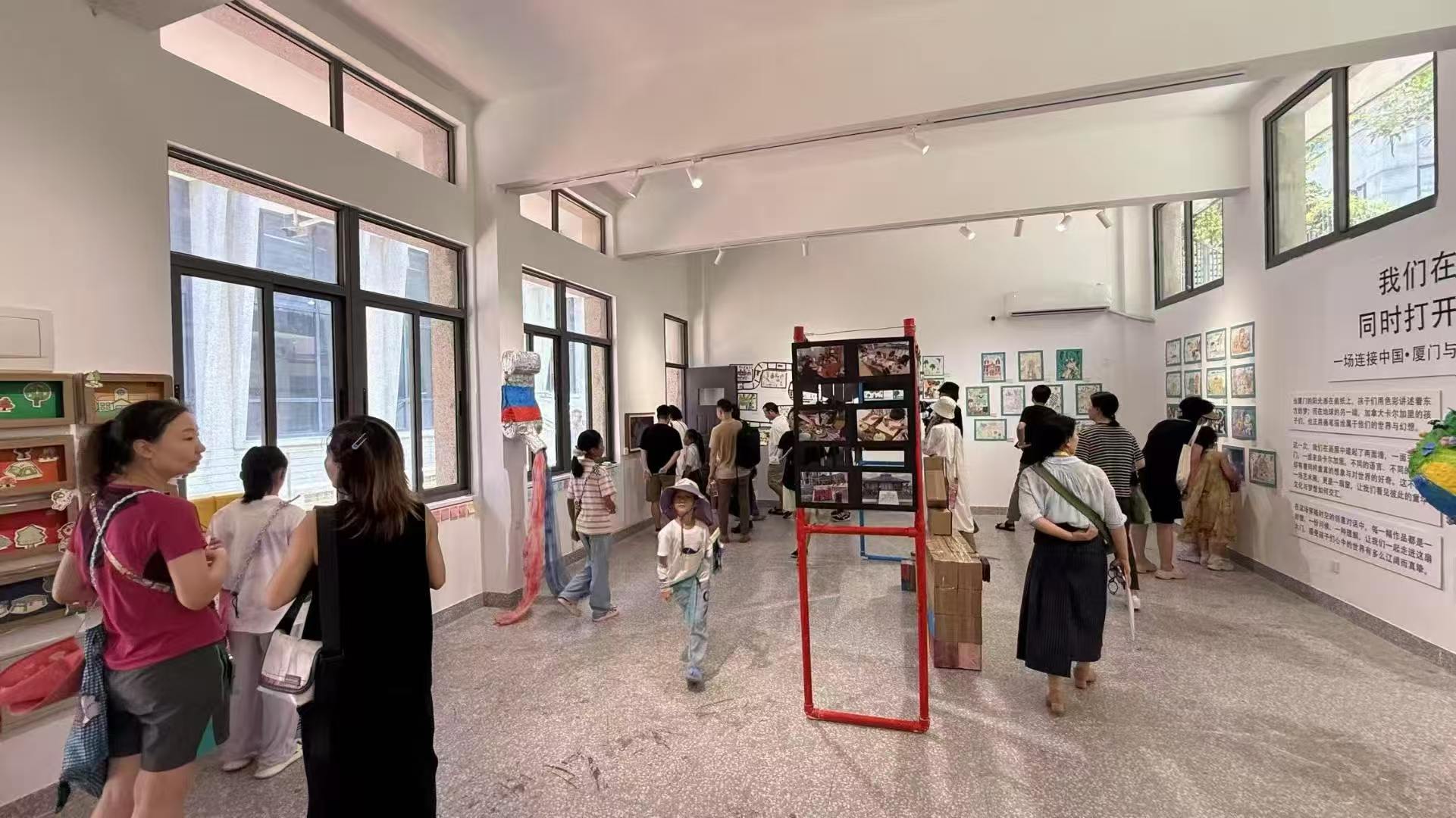 Wide view of visitors in Gulangyu Academy exhibition room