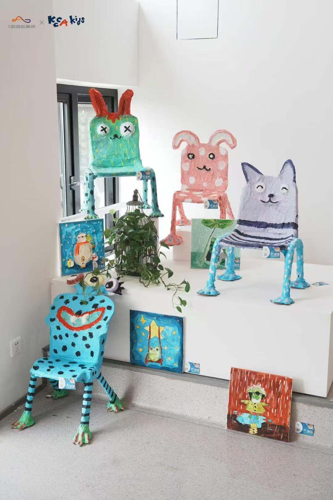 Painted chairs and artworks displayed at Putong Children's Art Festival